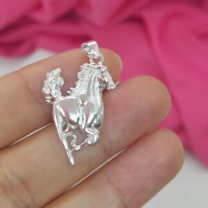 Dije Crisa ( 2 × 1,5cm aprox.)