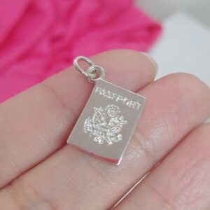 Dije Pasaporte 1,5x0,8cm aprox.